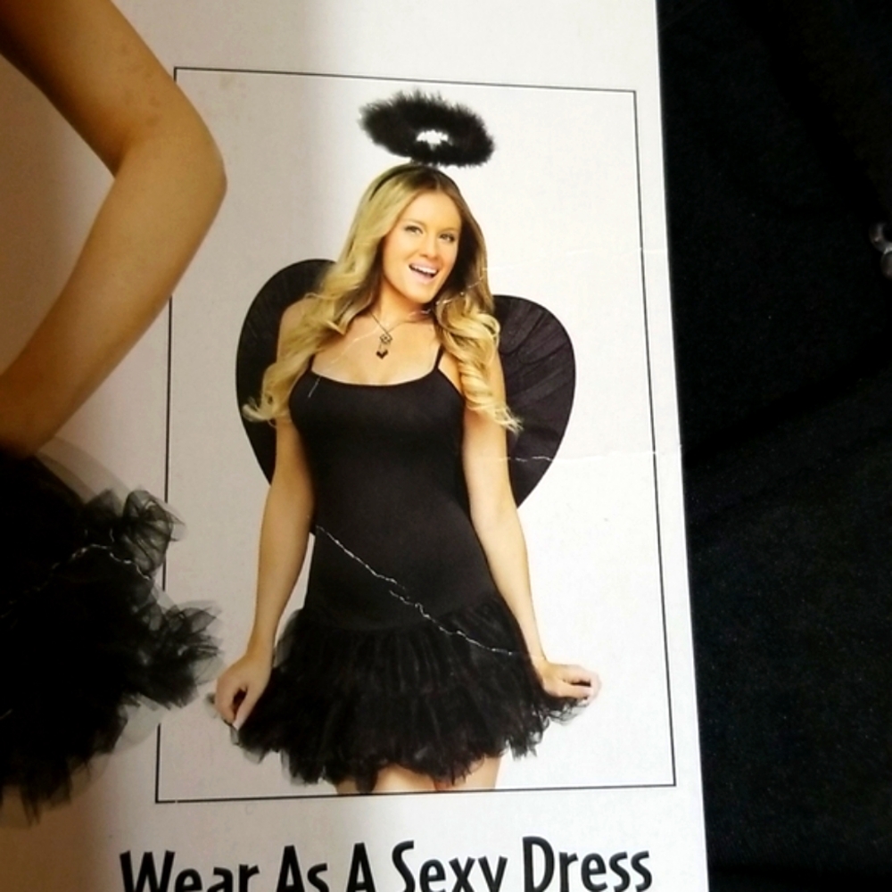Mini Dress, New stretchy with adjustable straps , tulle bottom. Petticoat